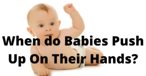 When do babies push up on their hands?